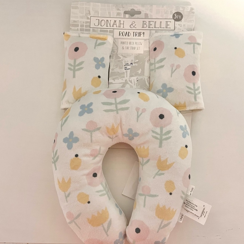 NWT. Neck pillow and car strap set.